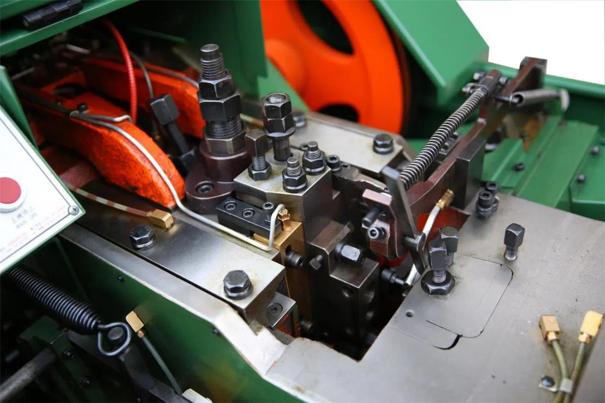 A Riveting Machine Is Used to Automatically Set a Metal Fastener Called a Rivet